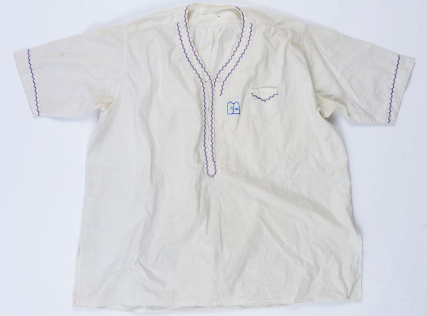 Shirt that Chaya-Fruma (Chayke) Daich embroidered in the Kovno ghetto for her brother Shmuel Daich before he left to join the partisans in the forest