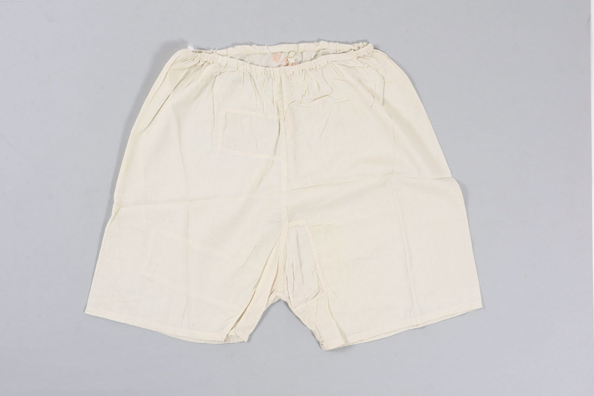 Trousers worn by Else Geismar from Koeln, Germany, when she was in Theresienstadt. Geismar's transport number is embroidered on the trousers.