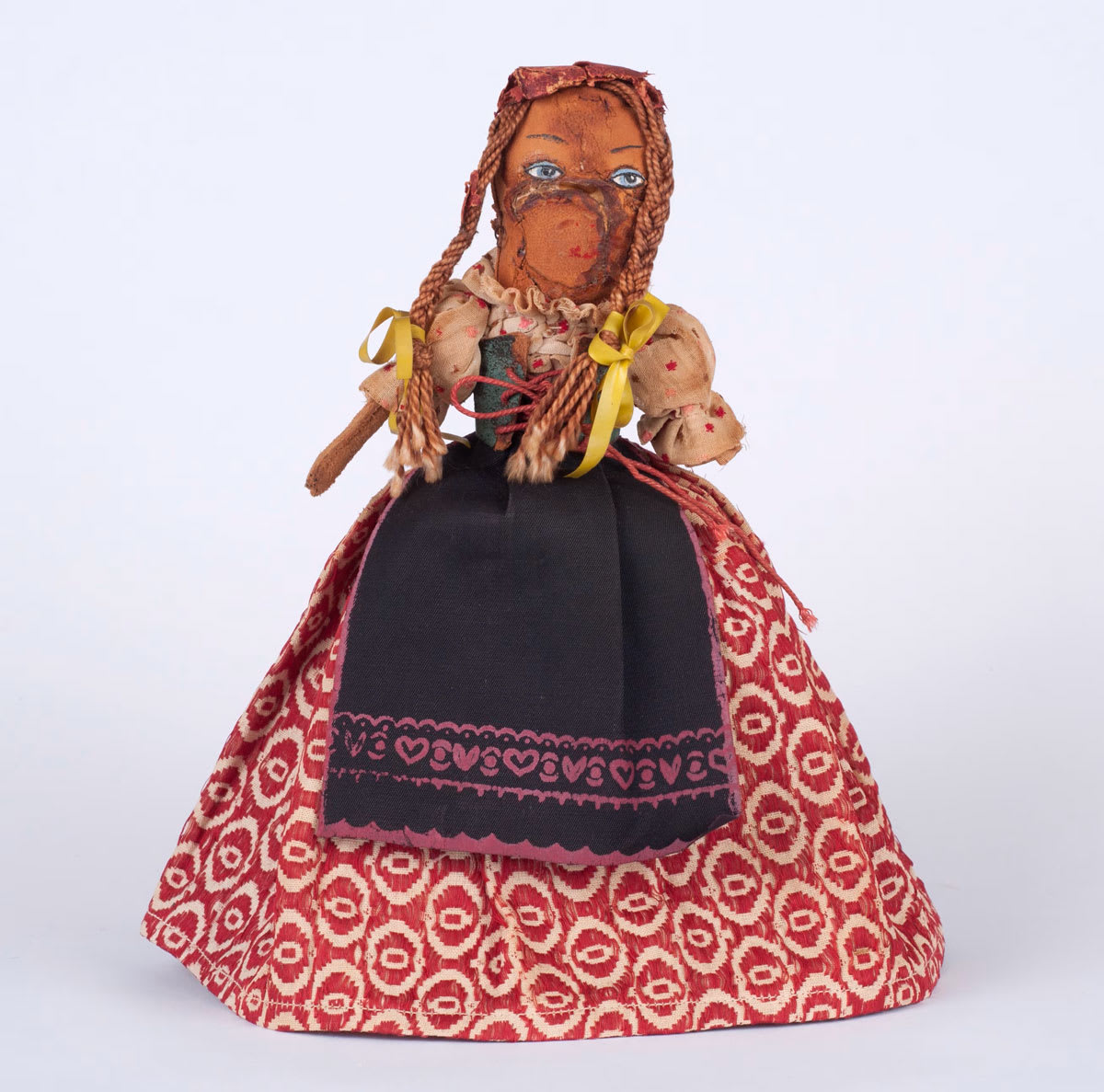 Doll made by Paulina Klauber in Theresienstadt from materials that she found in the Ghetto.