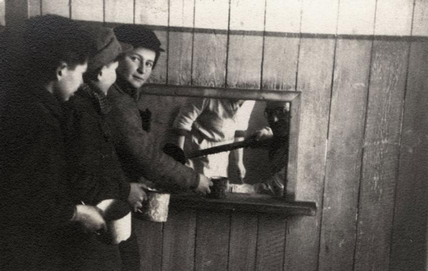 Youth in line for distribution of soup in the workers' kitchen in the Kovno Ghetto, Lithuania, December 1943
