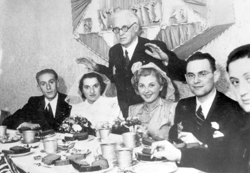 Chairman of the Lodz Judenrat Mordechai Rumkowski blesses two brides
