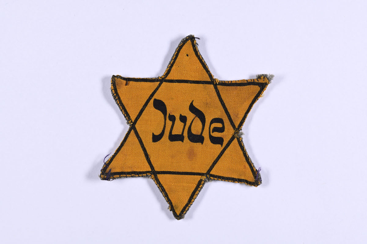 Identifying badge that the Jews of the Reich and "Protectorate" were forced to wear, kept by Shoshana Pin
