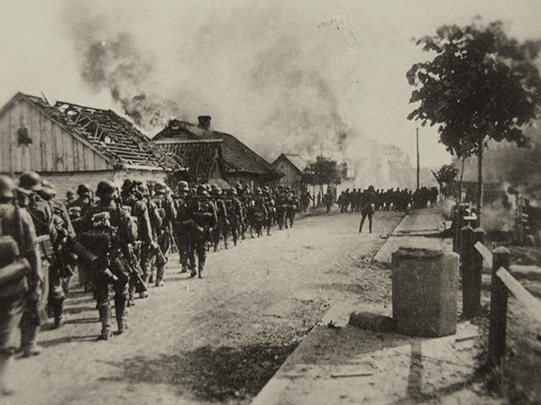 USSR, German soldiers marching into a town