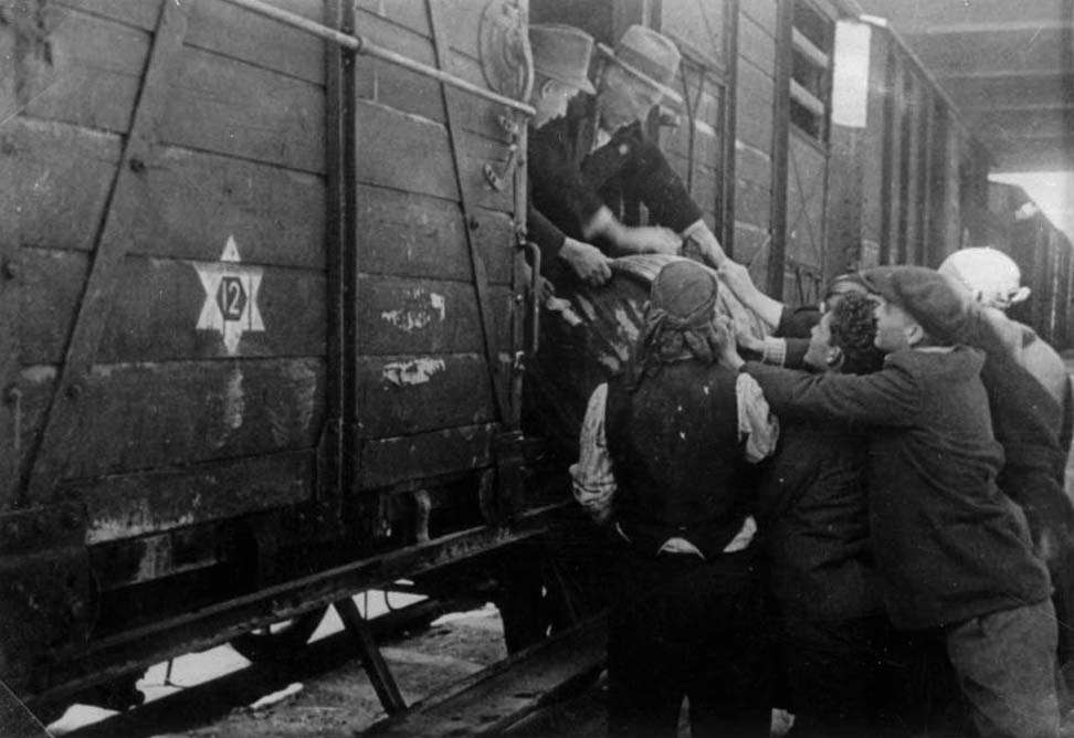 Jews boarding a deportation train during the deportation of Macedonian Jews, Mach 1943
