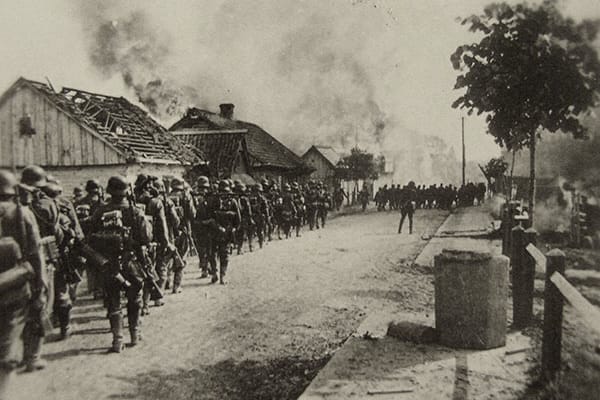 USSR, German soldiers marching into a town