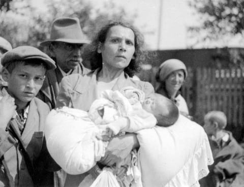 A Jewish woman with a baby and a child, during one of the deportations from Szydłowiec to the Treblinka extermination camp.