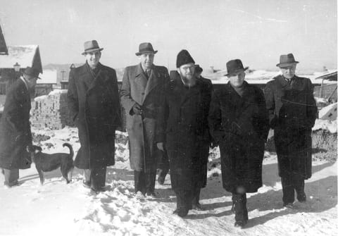 Members of the Jewish Committee in the Nováky forced labor camp, together with one of the rabbis from the Working Group
