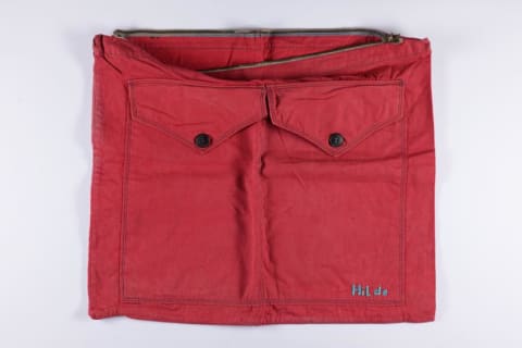 Cloth case in which Hilde Grünbaum kept the sheet music of the Auschwitz women's orchestra