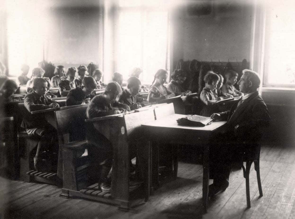 A teacher and pupils in a lesson in a Jewish school, Wroclaw, Poland, postwar