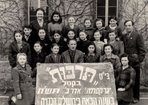 Children and teachers in the Jaeger Kaserne Displaced Persons' Camp, Germany, February 1948
