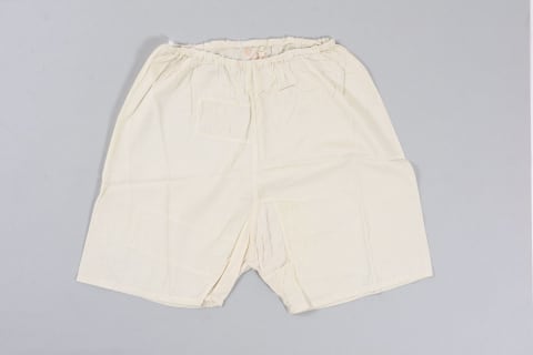 Trousers worn by Else Geismar from Koeln, Germany, when she was in Theresienstadt. Geismar's transport number is embroidered on the trousers.