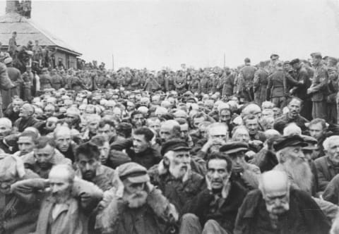 Zhitomir, Ukraine, German soldiers surrounding Jews in the market square, 07/08/1941.