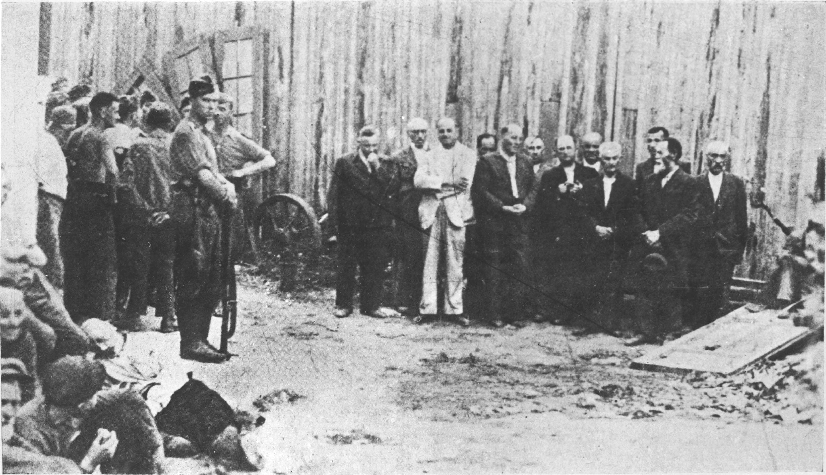 Members of the Jewish committee just before their execution. The man in the white suit was Bernard Walter, the head of the Jewish committee