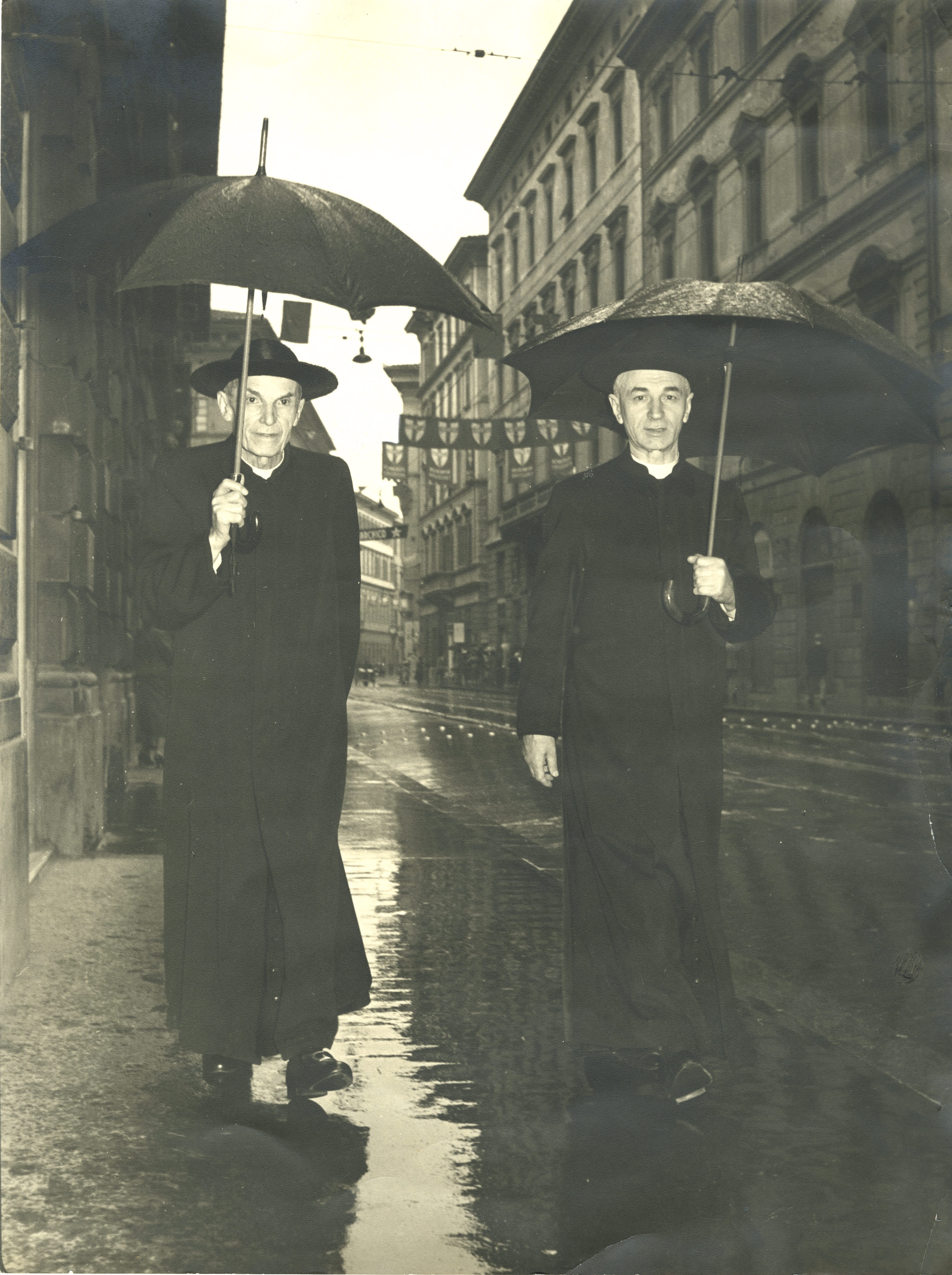Cardinal Dalla Costa (left) with Mons. Meneghello shortly after the end of the war, Mons. Meneghello (right) with Cardinal Dalla Costa, shortly after the end of the war