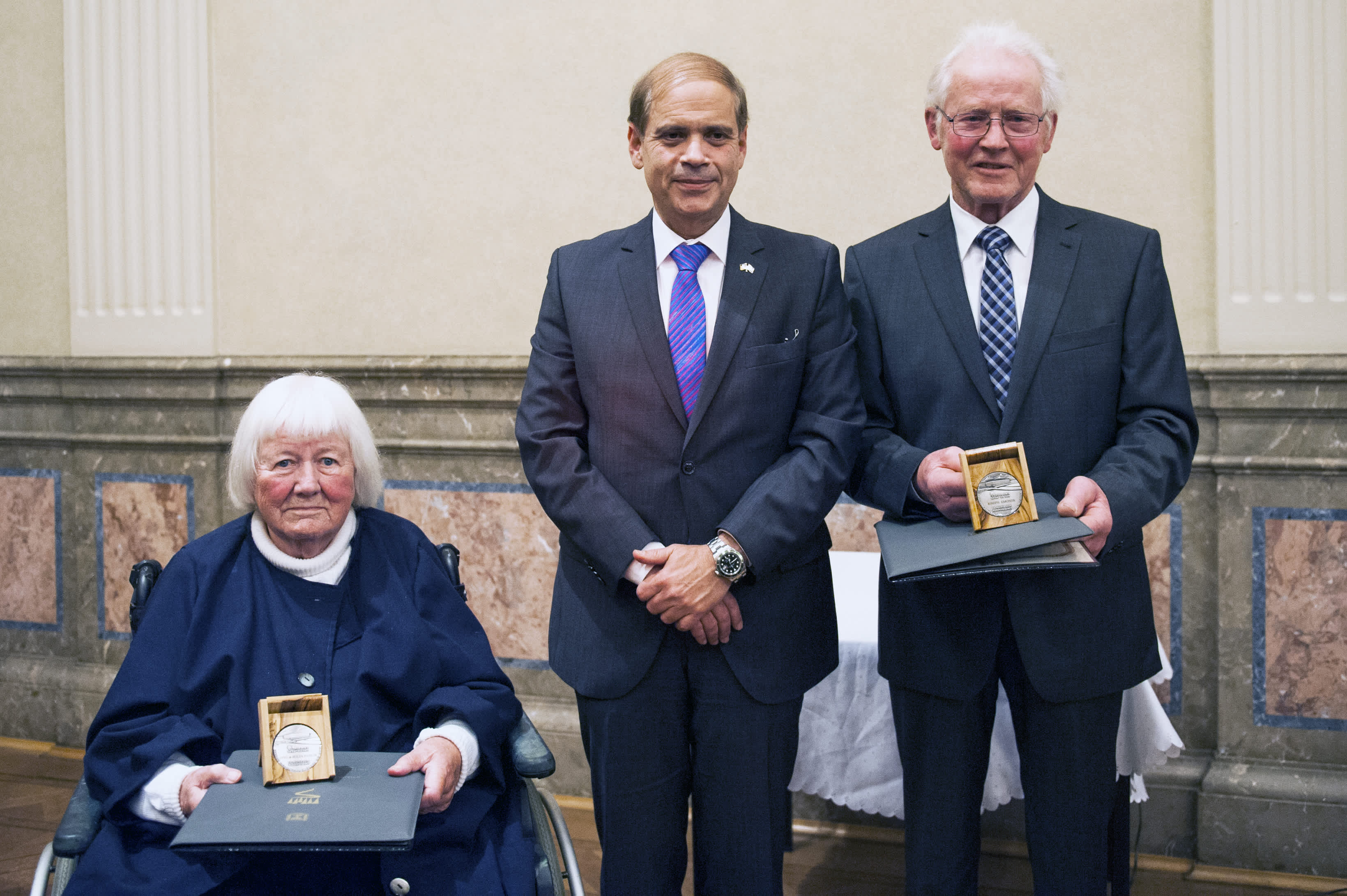 Eva Pankok, daughter of Hulda & Otto Pankok, and Josef Emonds, nephew of Joseph Emonds receive the Righteous awards from Israeli ambassador Hadas-handelsman, Berlin, 15 December 2014