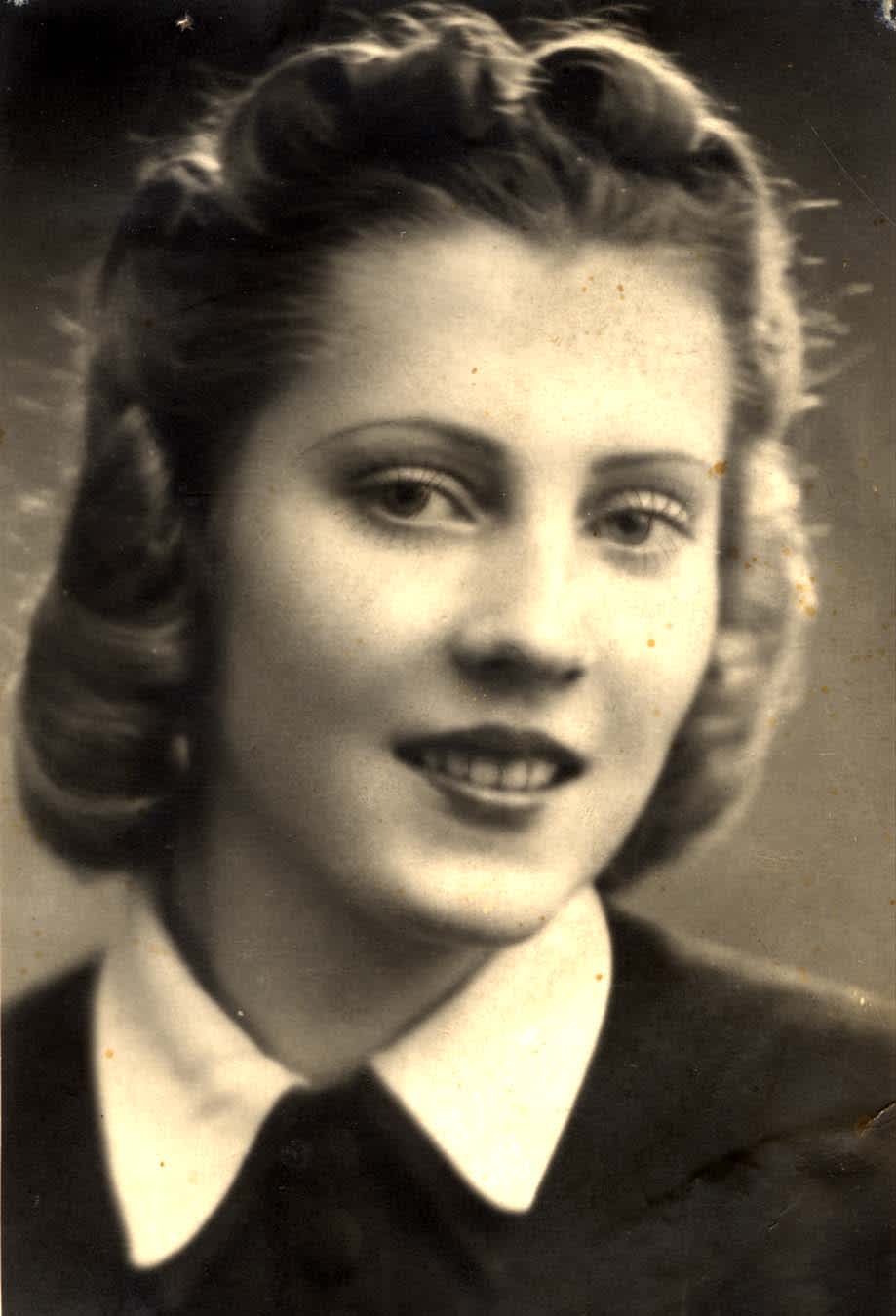 Irena Gut, 1939, planting the tree in honor of Irene Gut Opdyke