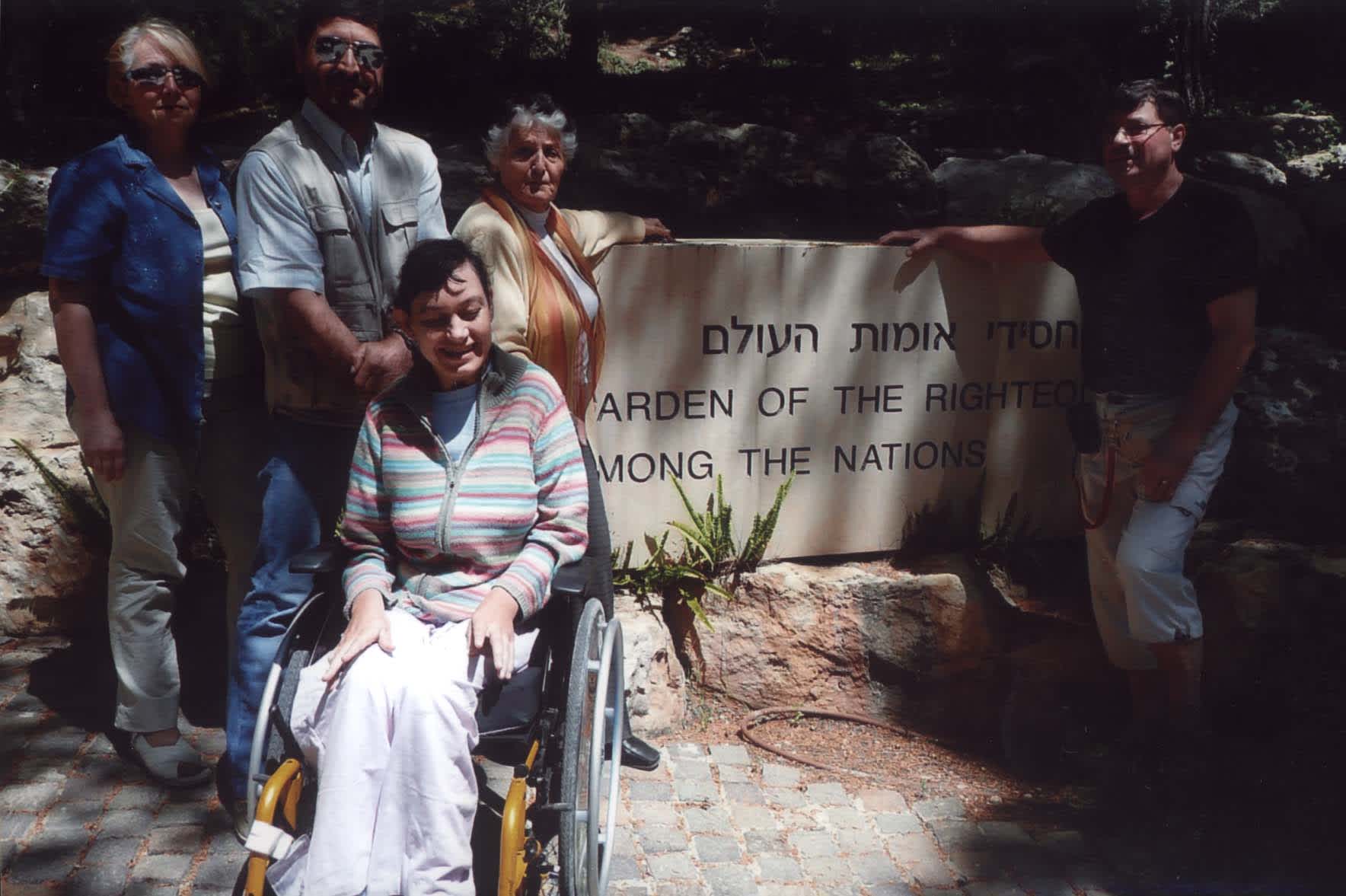 Survivor Berthe Badihi with the rescuer's children at Yad Vashem