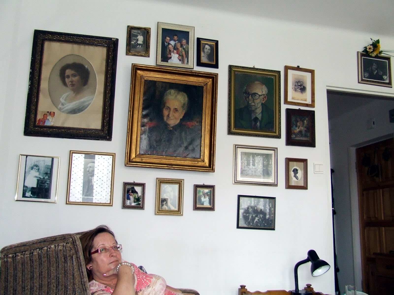 Danuta Renk (Mikulski) at her home in Bilgoraj, 2007. on the walls are family pictures.