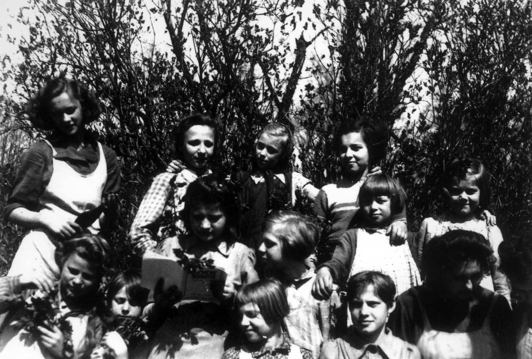Inna Fridman (top row, first right) among children from the orphanage. 1943
