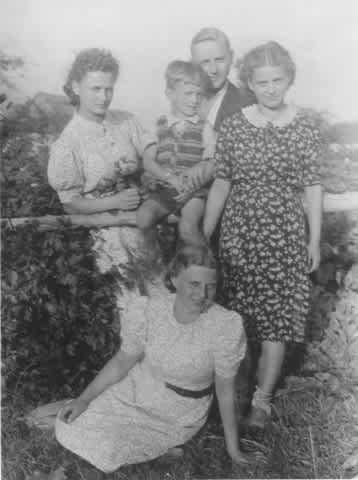 Lucyna Bialowarczuk (left), her husband, Waclaw (behind), and their nephew Andrzej
