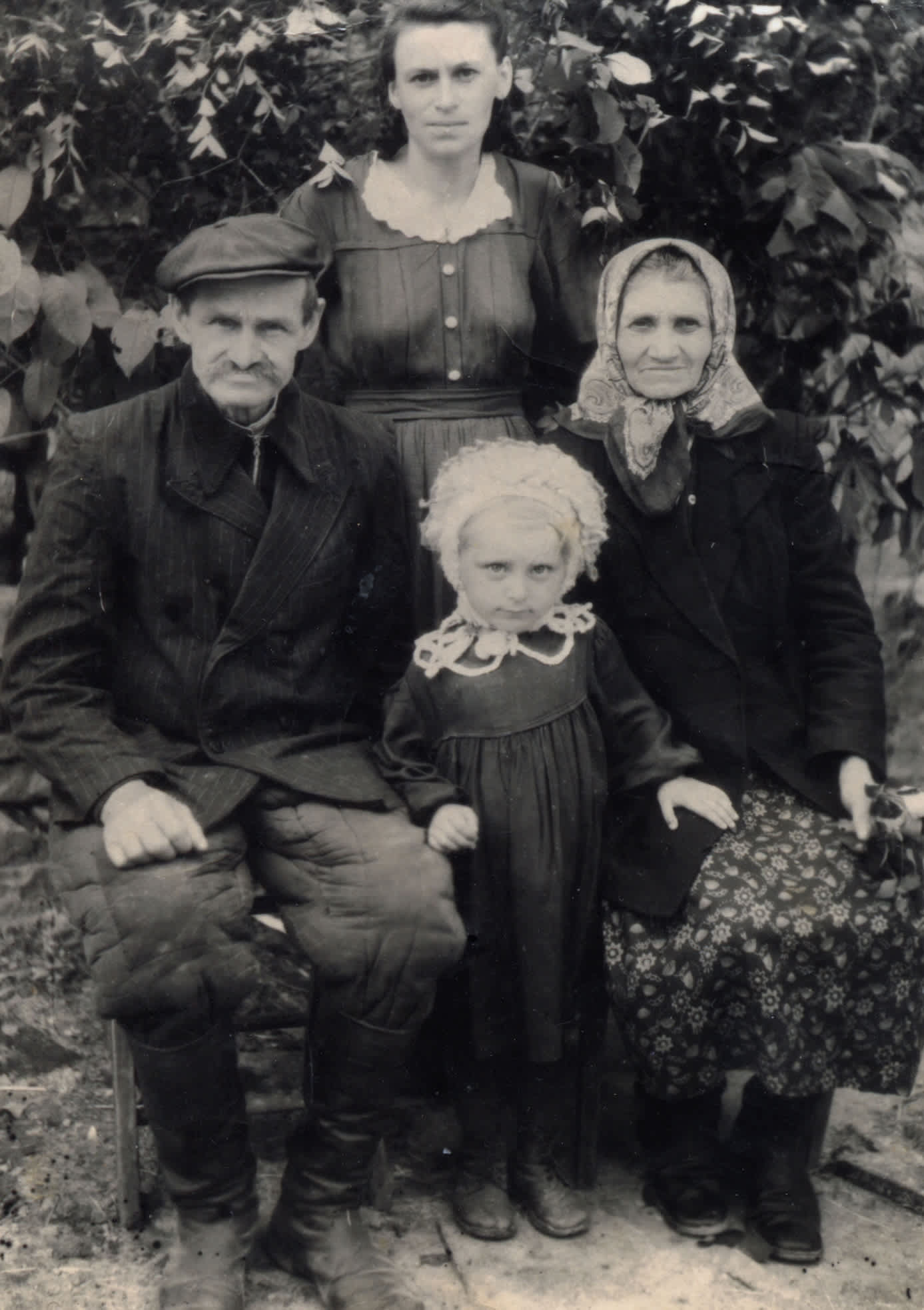 Marina and Vasili Dzhyvulski with their daughter and the granddaughter, Vasili and Marina Dzhyvulski with their daughter and granddaughter