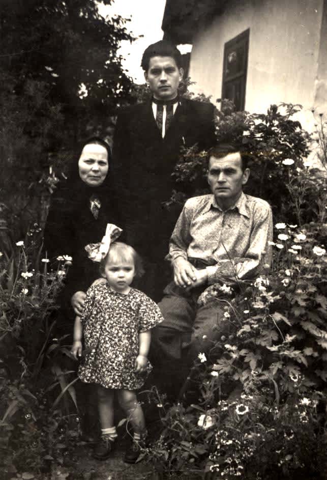 Pavel and Lubov Gerasimchik and their son Nikolay, Rescuers Pavel and Lubov Gerasimchik (sitting) with their son Nikolay