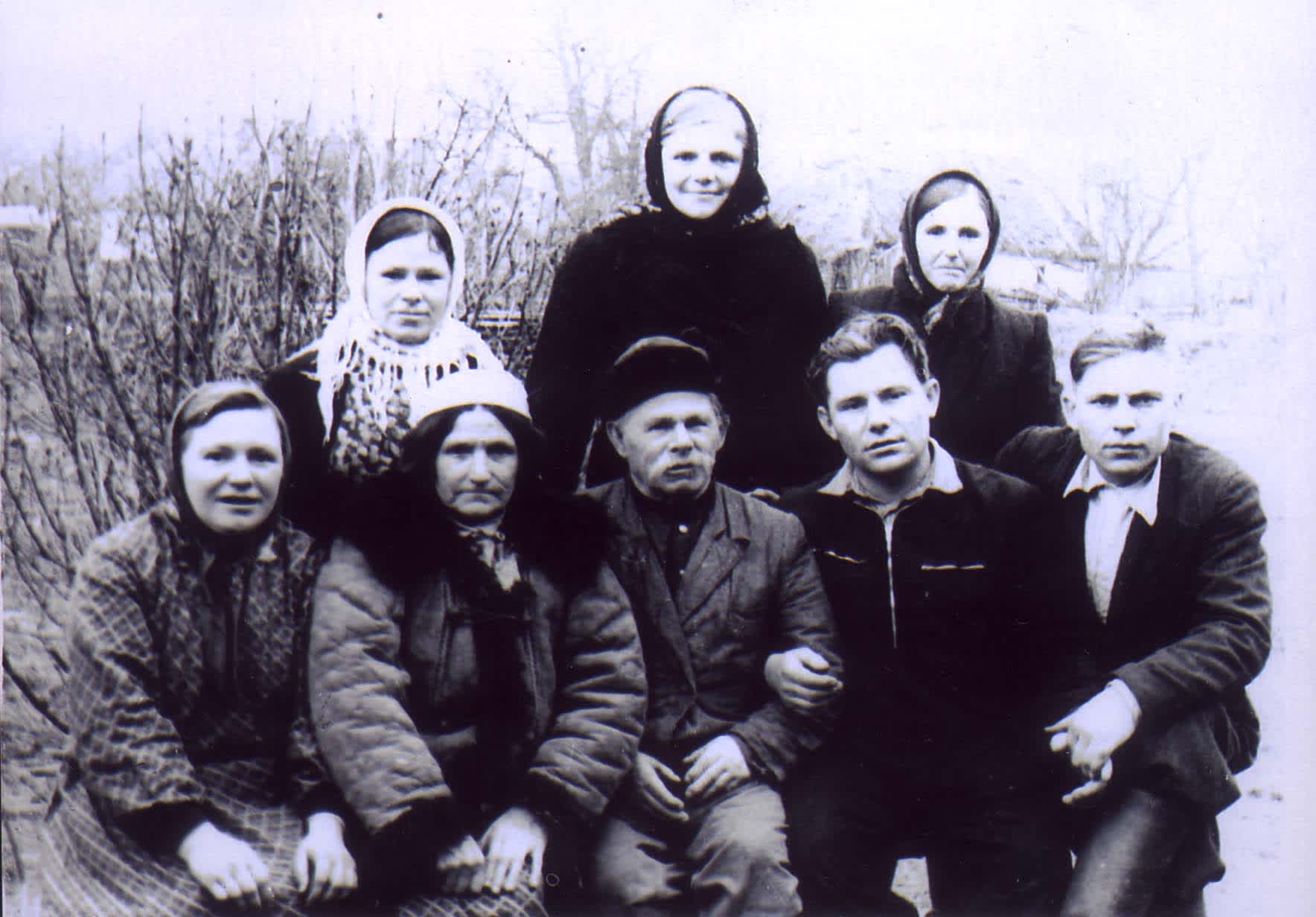 The Matviuk family. Anna Matviuk, her husband Vakula and son Lavrenty (Sitting in the centre in the first row)