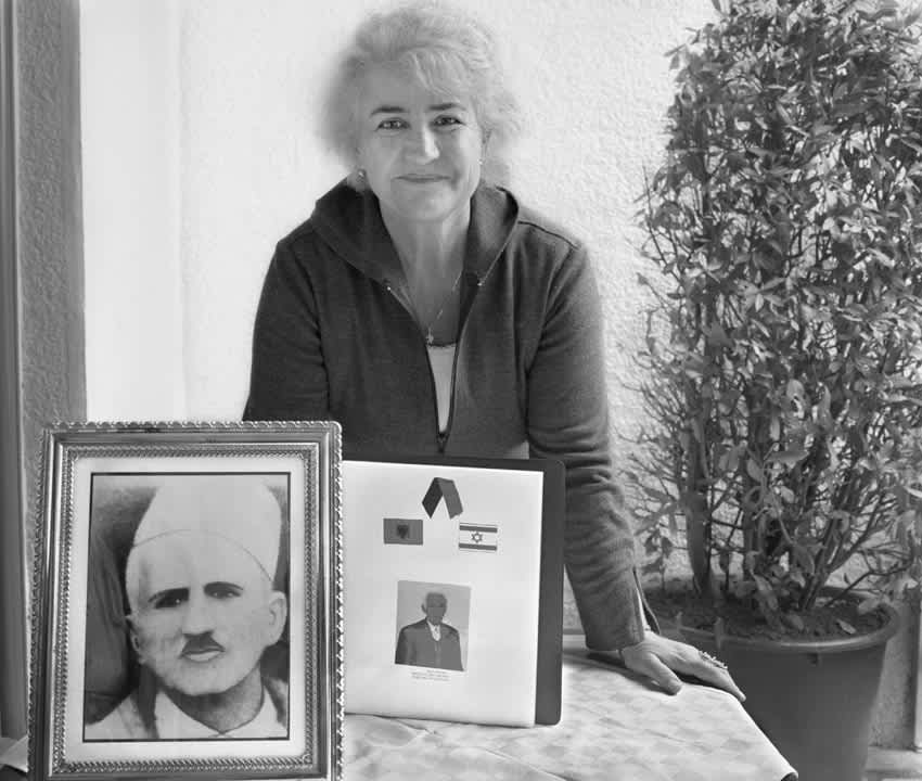 Elida Biçaku with photographs of her father, Njazi Biçaku and her grandfather, Mefail Biçaku (left), Elida Bi?aku with photographs of her father, Niazi Bi?aku and her grandfather, Mefail Bi?aku (left)