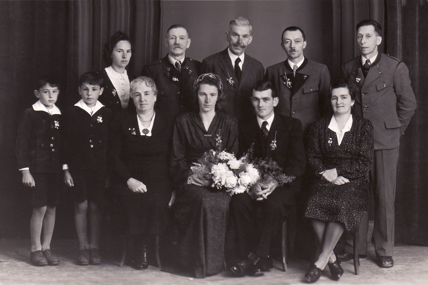 Fritz Fasching's wedding, 1948. Maria Fasching sitting on the right.