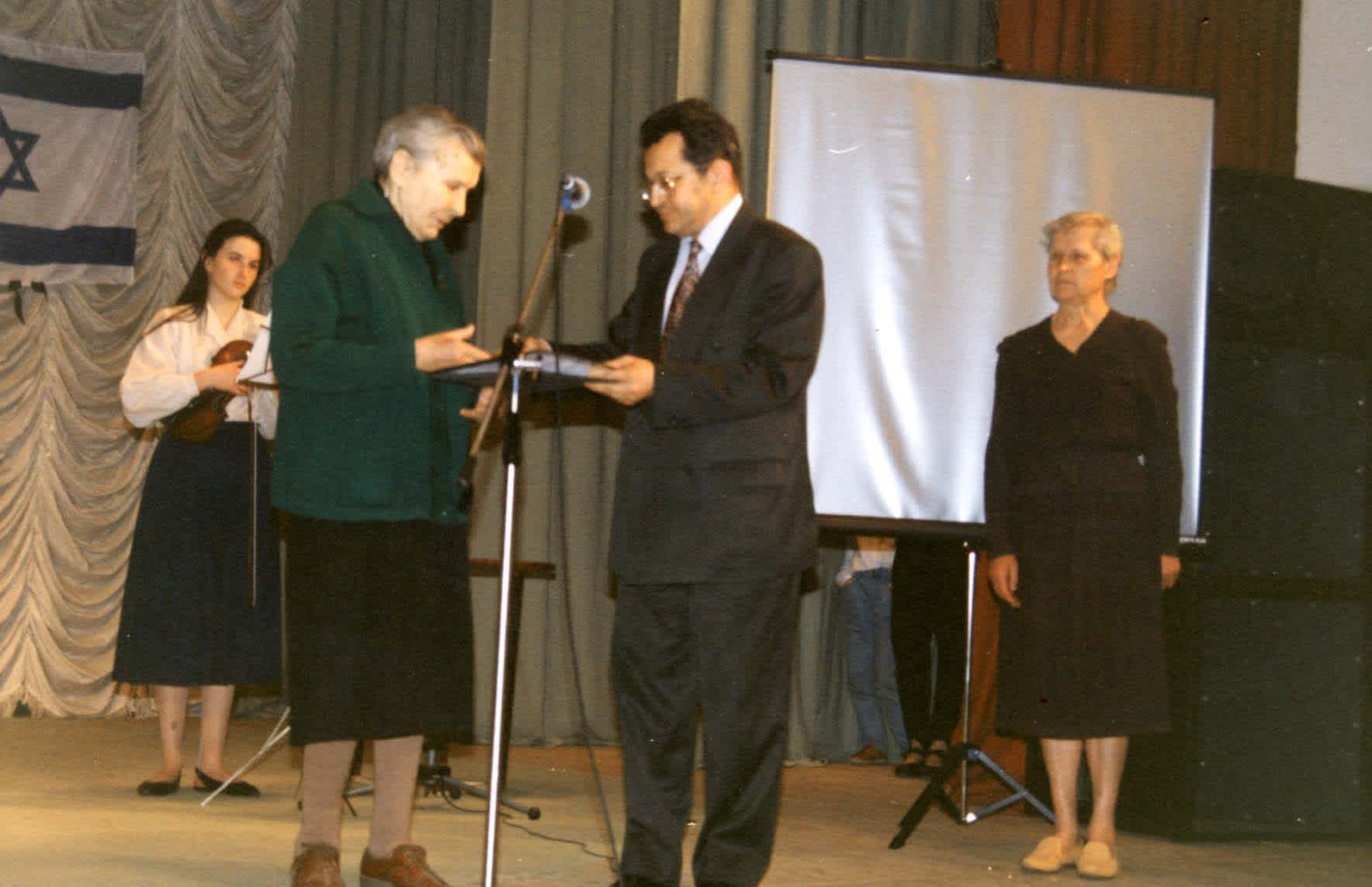 Maria and Tamara at the Righteous Among the Nations Ceremony; the ambassador of Israel is handing the Diploma of Honour to Maria Osipova, 27.04.95