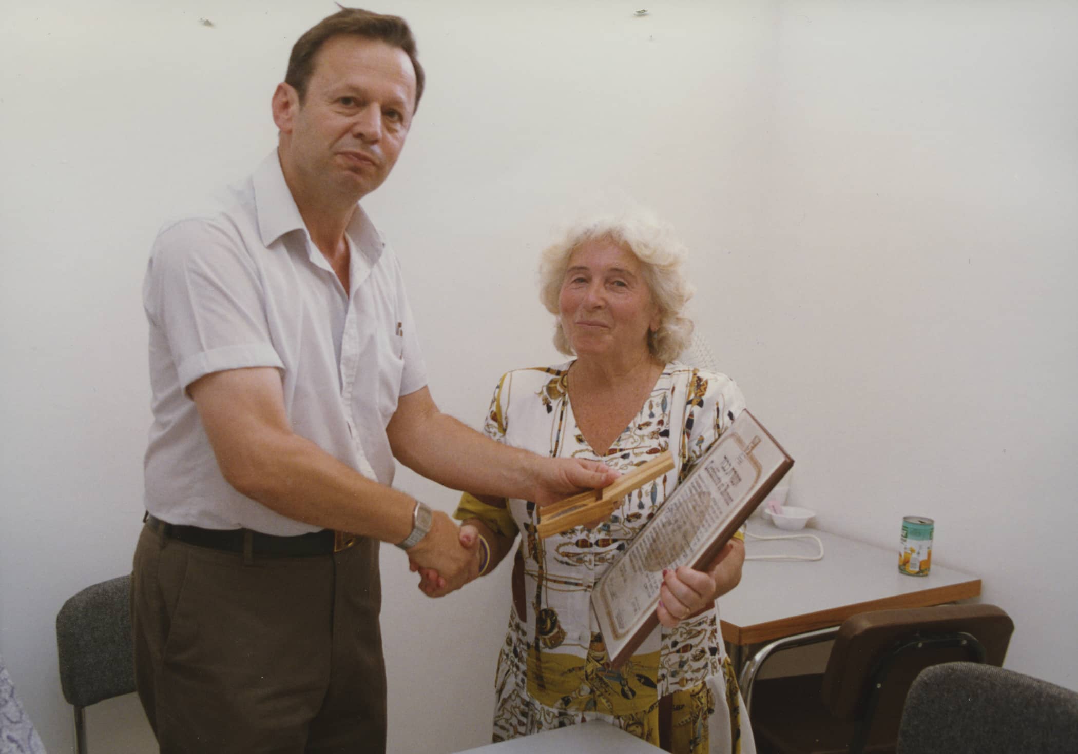 Lidia Krimer recieves her certificate of honor. 30.08.1993