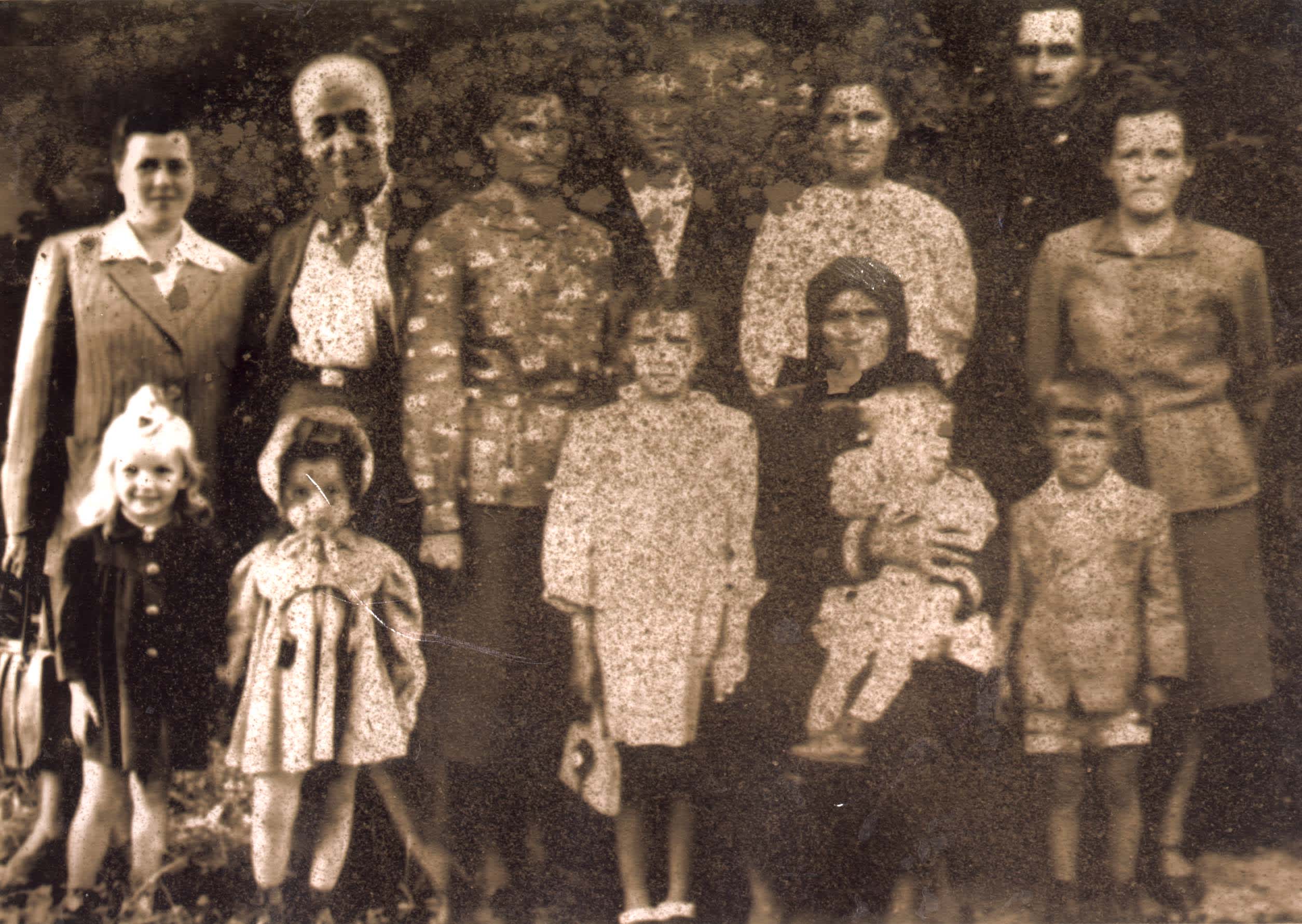 Rescuer Olga Datsko (the first one on the right) and survivor Mikhail Ehre (the second one on the left), 1946
