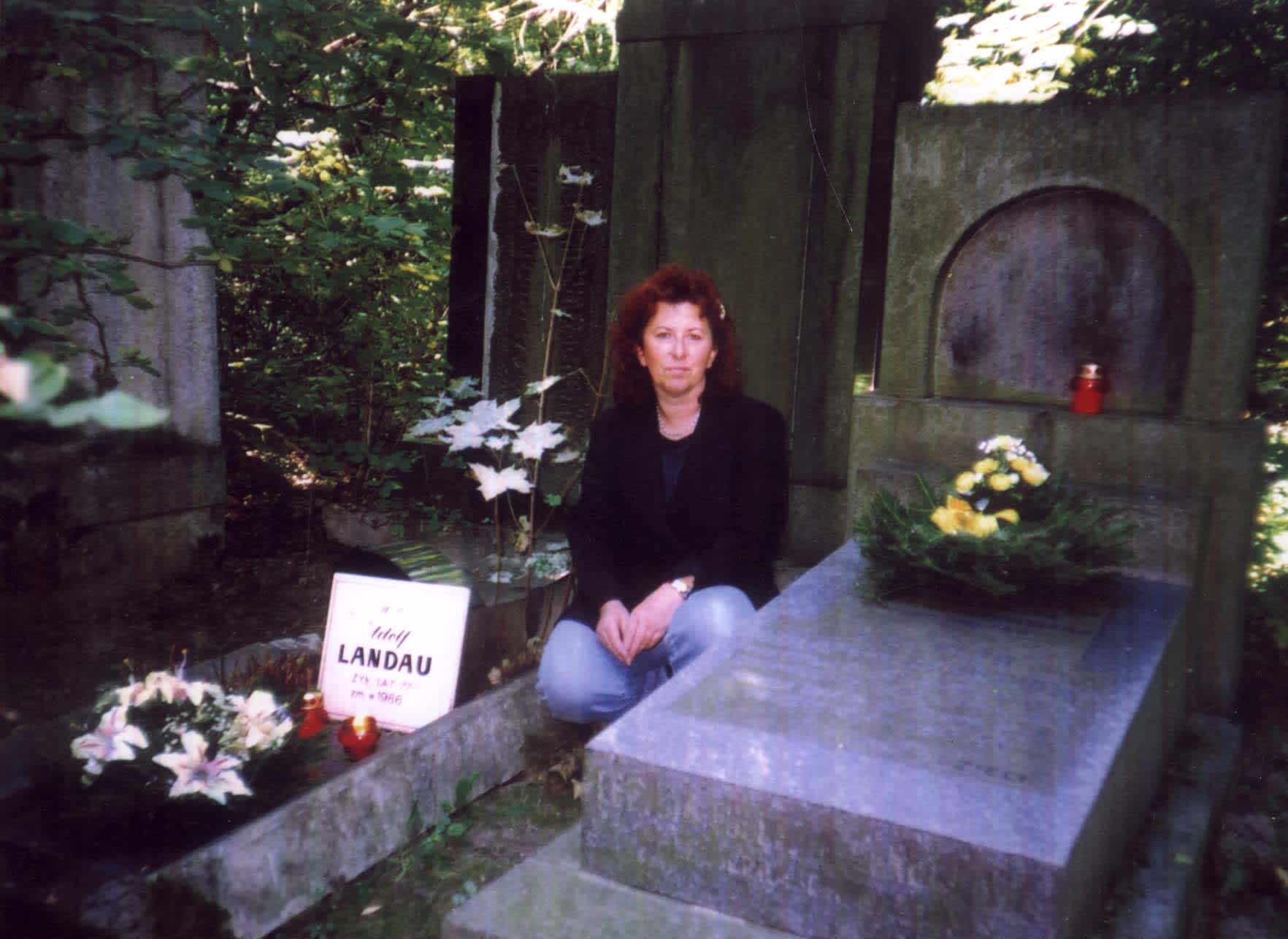 Adolf Landau's daughter near his grave. Warsaw