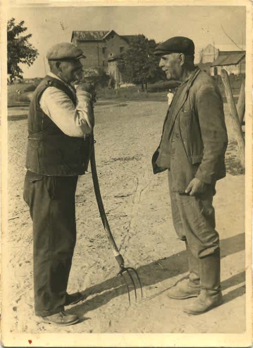 back of the photograph, Stepan Gaiduk (on the right, without a hayfork) with his relative. 1967