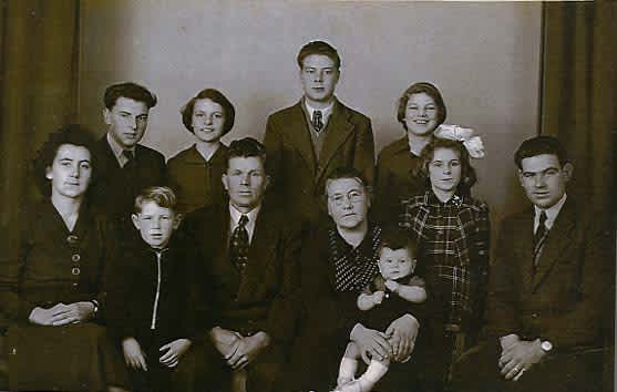 The rescuers' family, 1945. fr.l to r. sitting: Grietje, Nico, Hendrik, Geertje, Henk, Geertje and Egbert.  Standing: Meindert, Niesje, Jan and Jannie