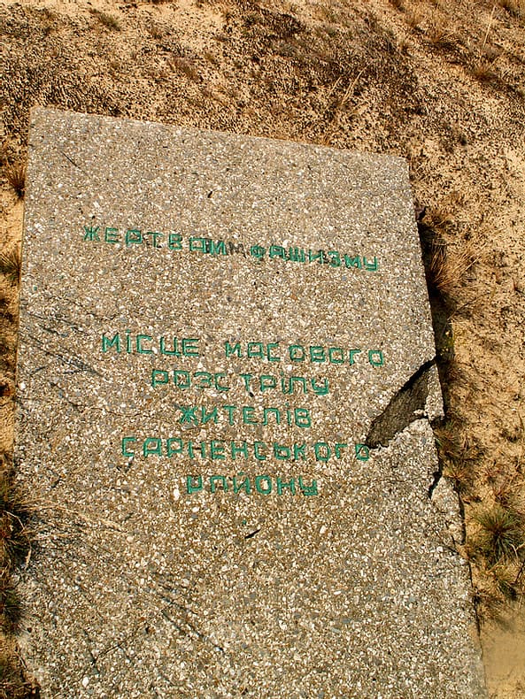 The plaque near the Soviet monument.